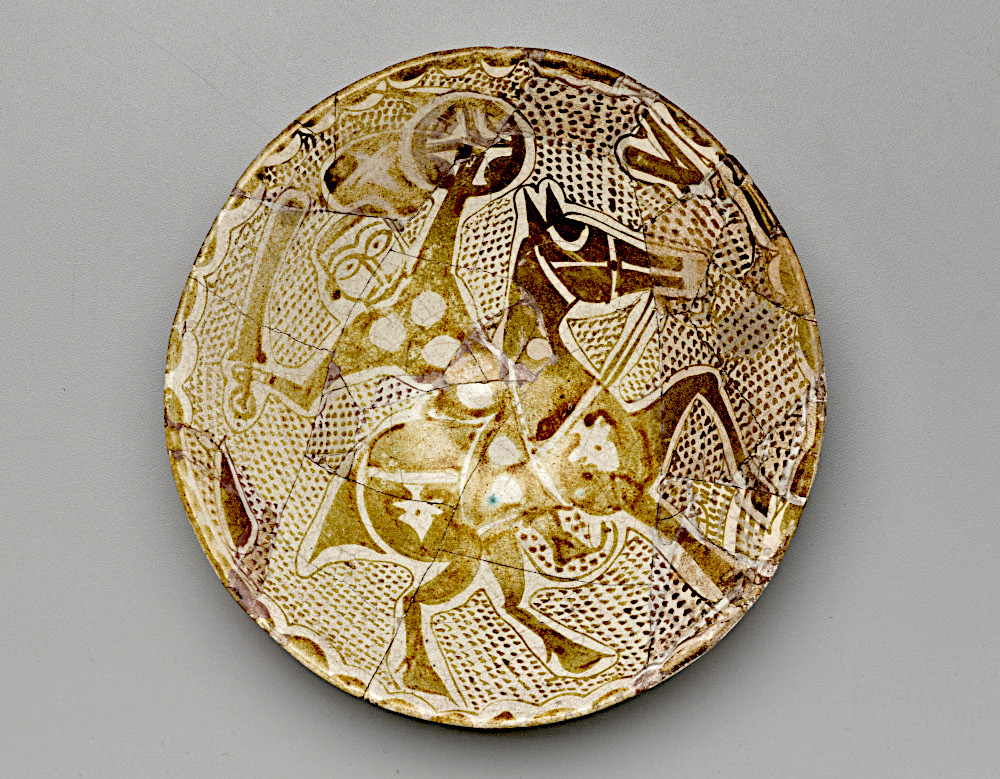 Although al-Nadim did not discuss the plastic arts -- not even pattern-welded sword making -- this Iraqi ceramic bowl with luster-painted decoration from the 10th century epitomizes the only known true alchemy: turning lead-based paint into something that gleams like the sun. Image credit: The Keir Collection of Islamic Art on loan to the Dallas Museum of Art K.1.2014.233. CC0 1.0, universal public domain.